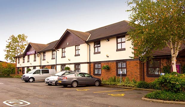 Exterior of Premier Inn Oldham (Broadway) showing car park